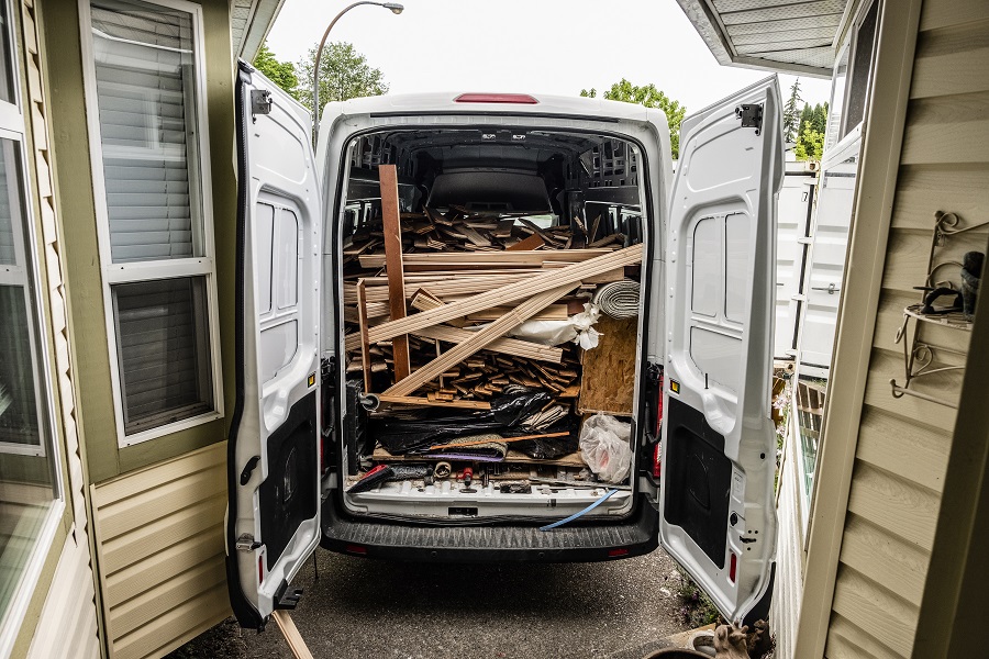 Work van full of hardwood removed from house.