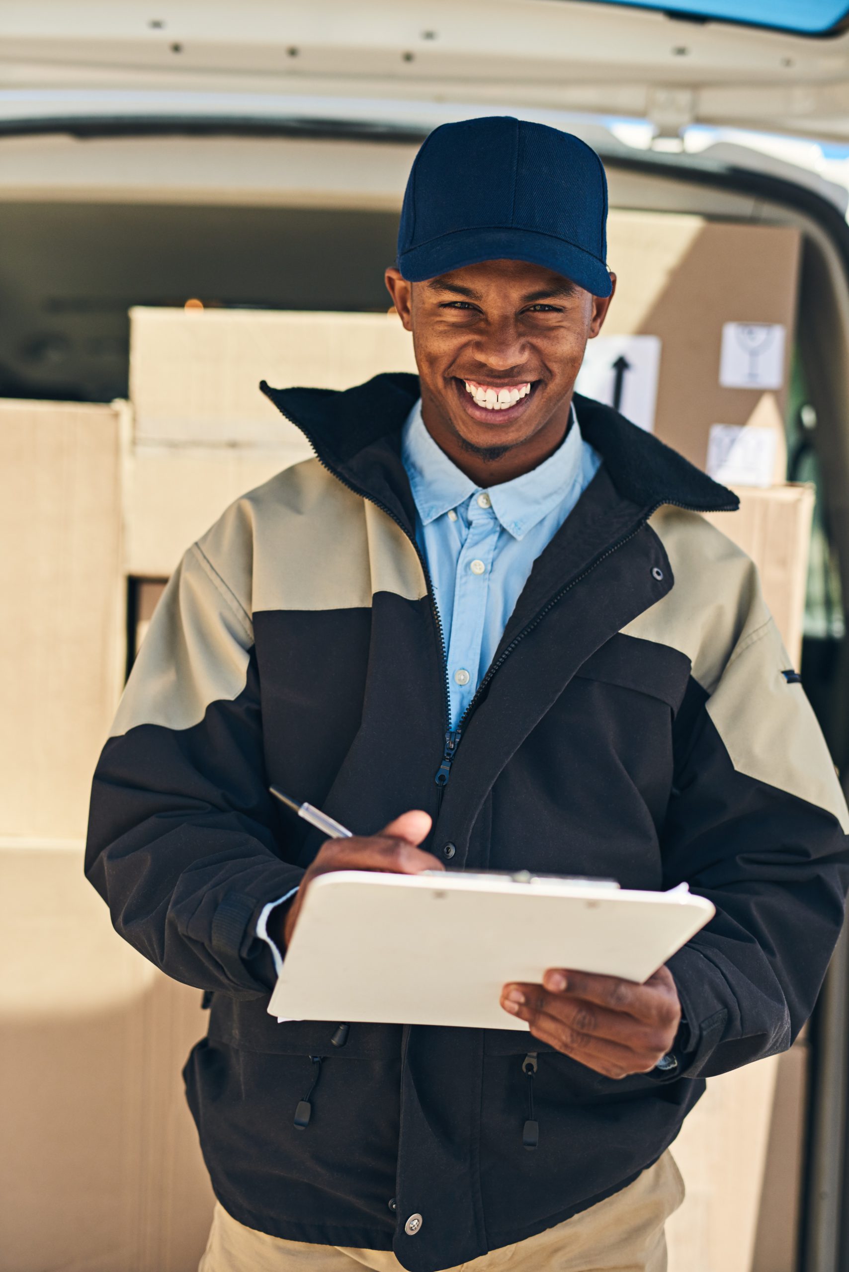 Happy man, portrait and van with clipboard for delivery, supply chain or checklist in logistics. Male person or courier guy with smile for parcel, package or box shipment for online order or service.